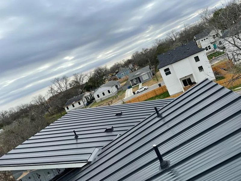 Standing seam metal roof panels with vents for Skylight Repair in Hudsonville